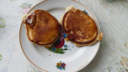 small pancakes on a plate for Breakfast