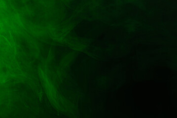 Green steam on a black background.