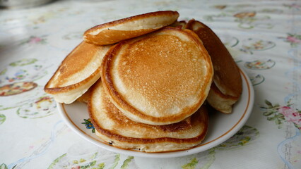 small pancakes on a plate for Breakfast