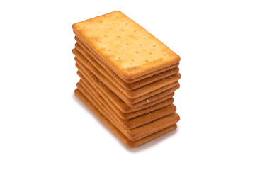 Cracker with salt isolated on white.
