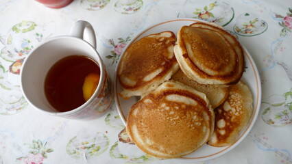 small pancakes on a plate for Breakfast