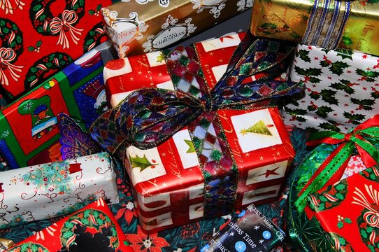 Christmas presents wrapped in colourful paper