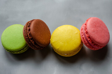 different macaroons cookies on a white background