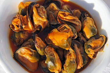 Mussels in chilli and tomato vinaigrette tapas (Mejillones en escabeche), Andalusia, Spain.