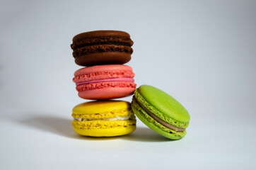 different macaroons cookies on a white background