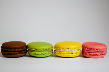 different macaroons cookies on a white background