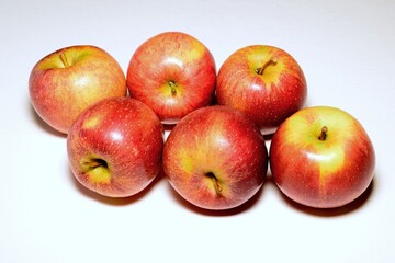 Braeburn apples against a plain white background, UK.
