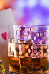 cocktail glass on the casino gambling table