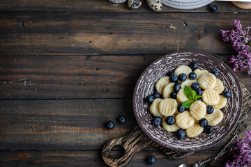 Lazy cottage cheese dumplings with fresh berry. Simple and healthy breakfast