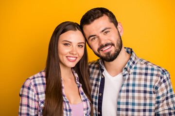 Close up photo of positive spouses sweethearts enjoy spend summer rest relax together wear plaid clothes isolated over bright color background