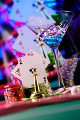 cocktail glass on the casino gambling table - 356884628