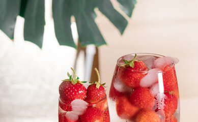 Strawberry Drink glass white background cocktail ice tropical leaves