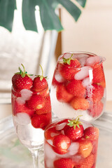 Strawberry Drink glass white background cocktail ice tropical leaves