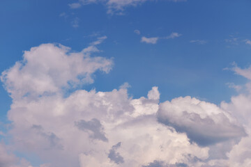 Blue sky with clouds background - 356887297