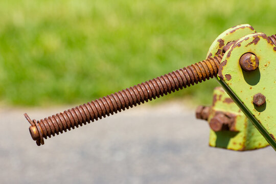 Old rusty fork joint head with threaded rod