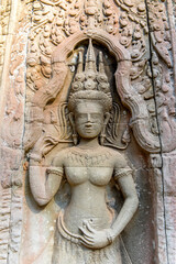 Apsara and Ta Prohm temple ruins, Angkor Wat complex, Siem Reap, Cambodia.