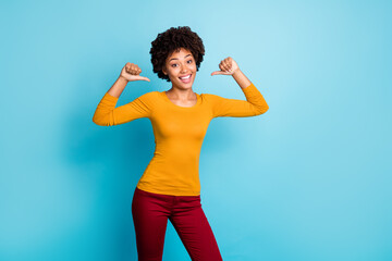 I am best. Cheerful candid afro american girl point herself with index finger enjoy her personality...