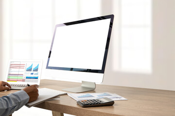 young man working Businessman using a desktop computer of the blank screen