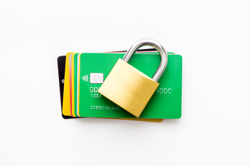 credit card with security lock on white desk top view