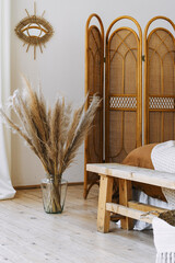 Cozy apartment in boho chic style interior with comfort bedroom