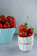 Harvest strawberries. Red berry in a bowl. Cook in the kitchen. berries for breakfast.