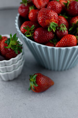 Harvest strawberries. Red berry in a bowl. Cook in the kitchen. berries for breakfast.