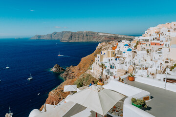 Oia Santorini Greece famous with romantic and beautiful sunsets. Oia village in Santorini...