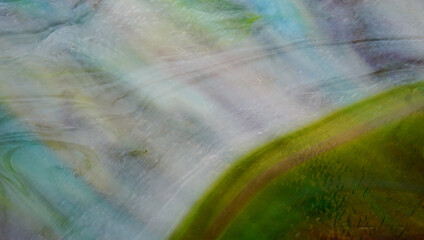 multi-colored glass bright in green tones, light green and dark green glass combine beautifully,...
