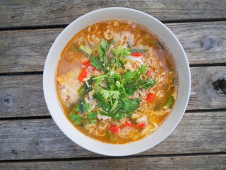The noodles and spices are in a ready-to-eat bowl.