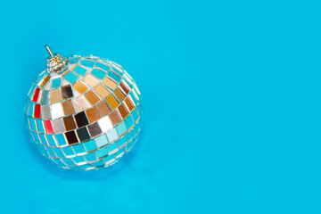 shiny toys balls on the Christmas tree for the new year holiday