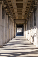 Long gallery corridor with columns in perspective