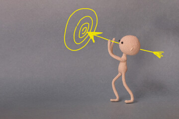 A toy man on a gray background with copy space. Presentation PowerPoint or Keynote. Motivational...