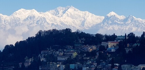 View of the snow mountains  overt the town