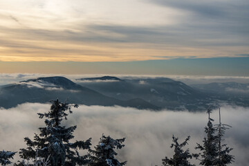Fototapeta na wymiar Smrk, Knehyne and Radhost hills from Lysa hora hill in winter Moravskoslezske Beskydy mountains in Czech republic