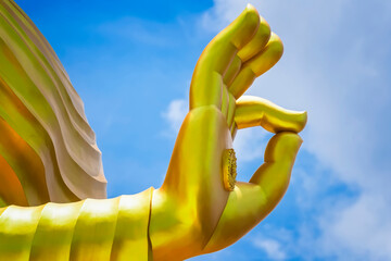 The hand of Big Goldden Buddha statue of Chareon Rat Bamrung Temple (Nong Phong Nok Temple) the...