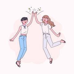 함께 점프하며 손뼉을 마주치는 여자들