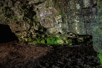 Stone wall in a cave, abstract nature background and texture.