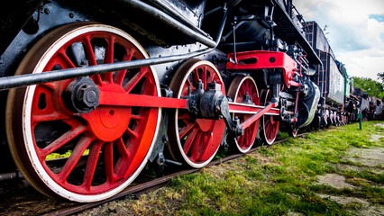 Red wheels of an old locomotive