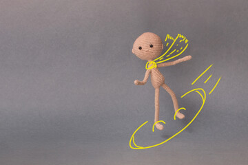 A toy man on a gray background with copy space. Presentation PowerPoint or Keynote. Motivational...