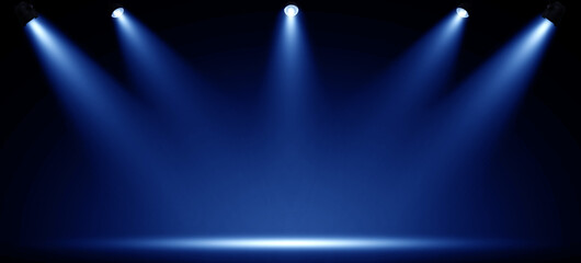 Spotlights illuminate empty stage