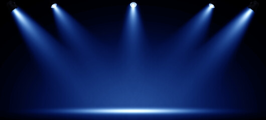 Spotlights illuminate empty stage