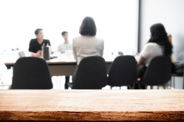 Empty wooden  platform with business meeting background for product display montage. Education concept.
