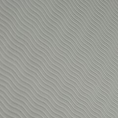 Elastic rubber texture of yoga mat in grey with wavy pattern