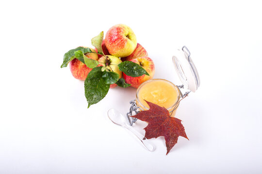 Fresh apples with homemade apple sauce and leaf