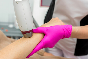 Laser epilation and cosmetology in beauty salon. Hair removal procedure. cosmetology, and hair removal concept