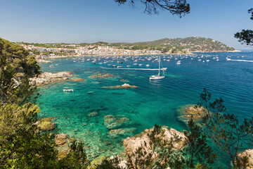 Boats on the waters of the meditarranean sea in a sunny summer day, Costa Brava, Catalonia, Spain