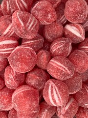 Sanded cinnamon candy balls usable as background