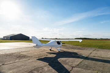 Small aircraft with propeller in parking lot . flight field and many aircraft in Poland 