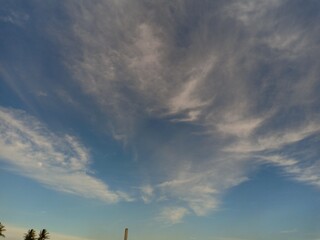 white and black clouds were seen late into the