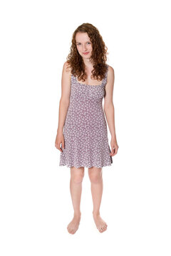 Full length portrait of a cute girl wearing a summer dress